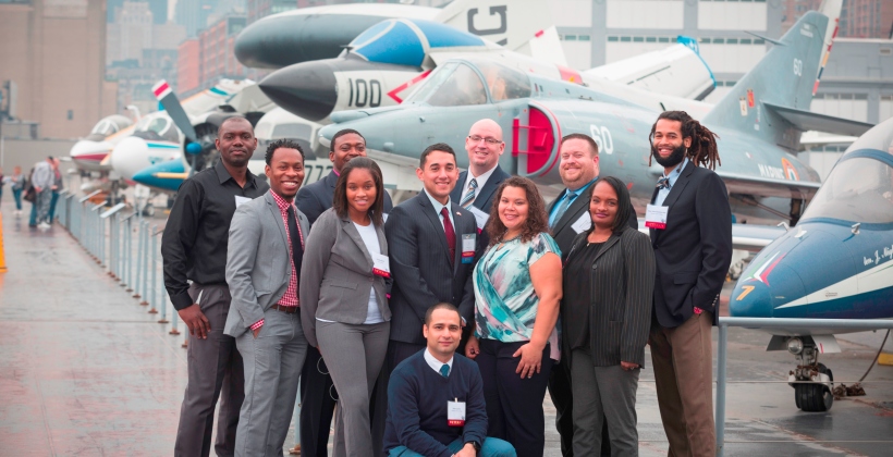 A group of award-winning CUNY students pose on flight deck of the USS Intrepid following the 3rd Annual CUNY Student Veterans’ Academic Awards.